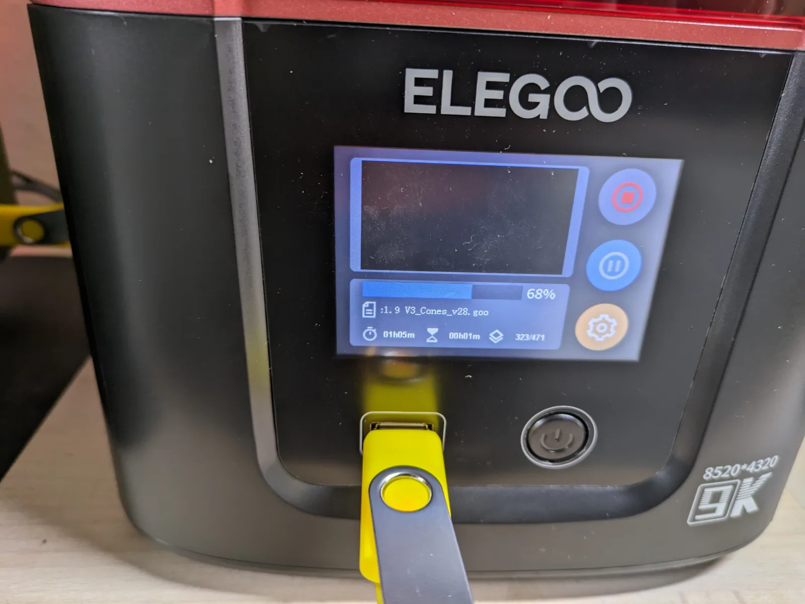 Elegoo Mars 4 touchscreen showing a Cones of Calibration print in progress at 68 percent, file name V3 Cones v28 dot goo, 323 of 471 layers