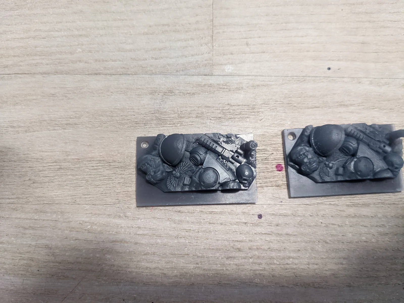 Two black-primed Space Marine scenic bases with detailed armour and equipment, printed on Mars 2 Pro at 50 microns