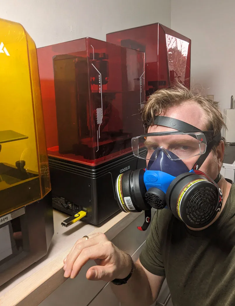 Peter looking unimpressed at a failed resin print in the workshop