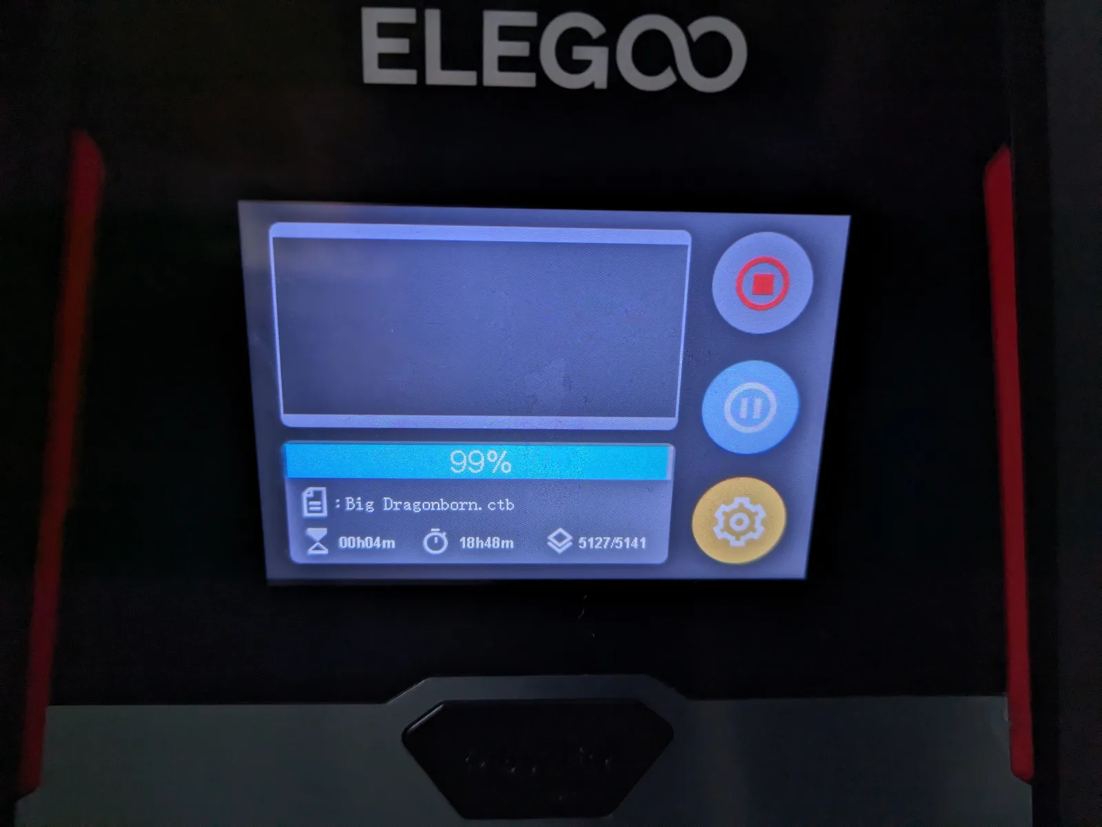 Elegoo Saturn 3 touchscreen showing 99% print completion with 18 hours 48 minutes elapsed and 4 minutes remaining