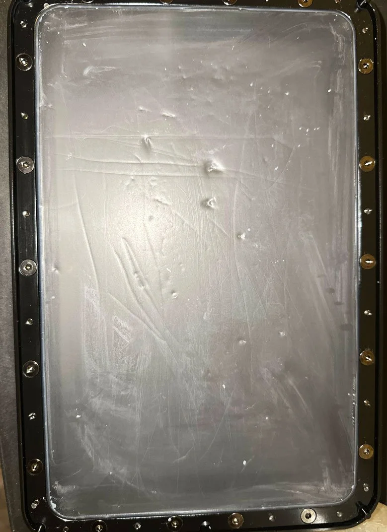 A failed resin print with a damaged FEP setup